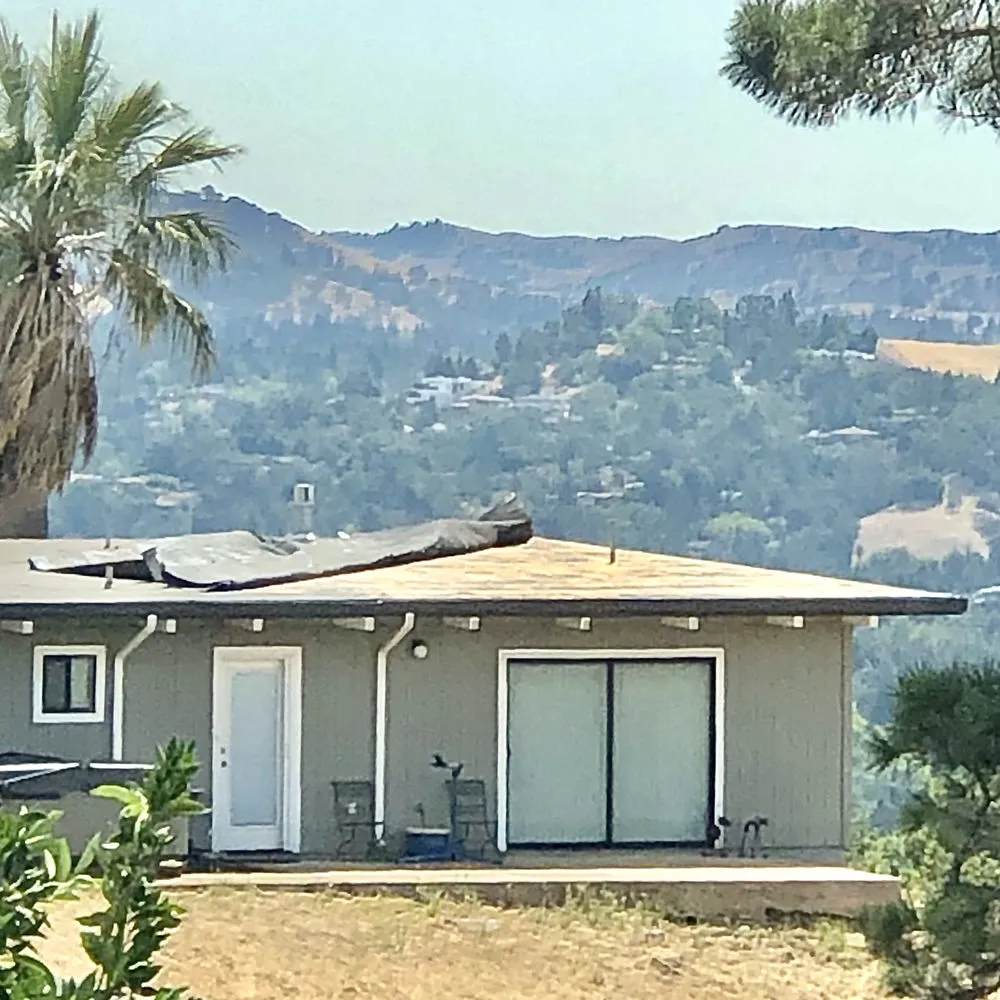 Slide of Abril Roofing