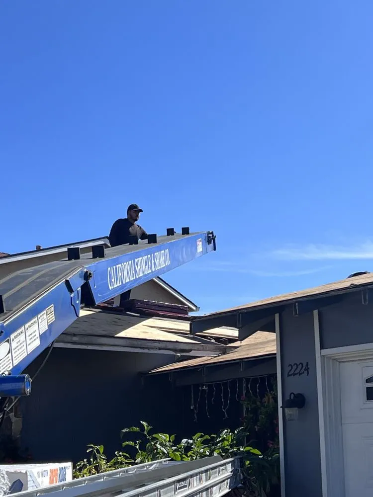 Slide of Abril Roofing