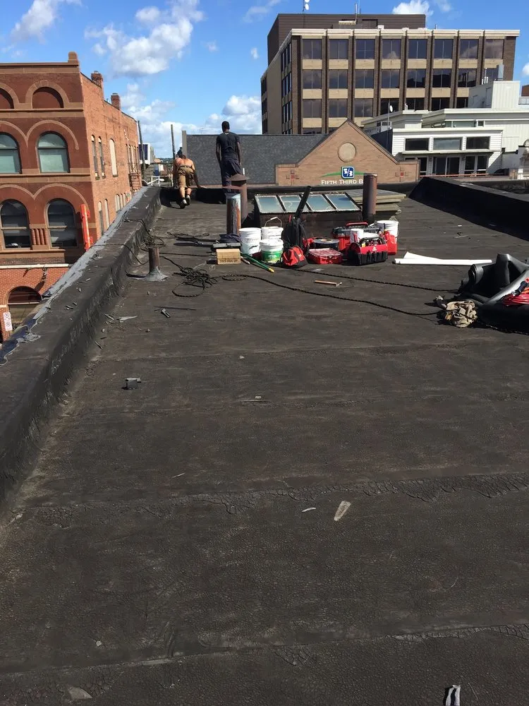 Slide of Absolute Roofing & Construction