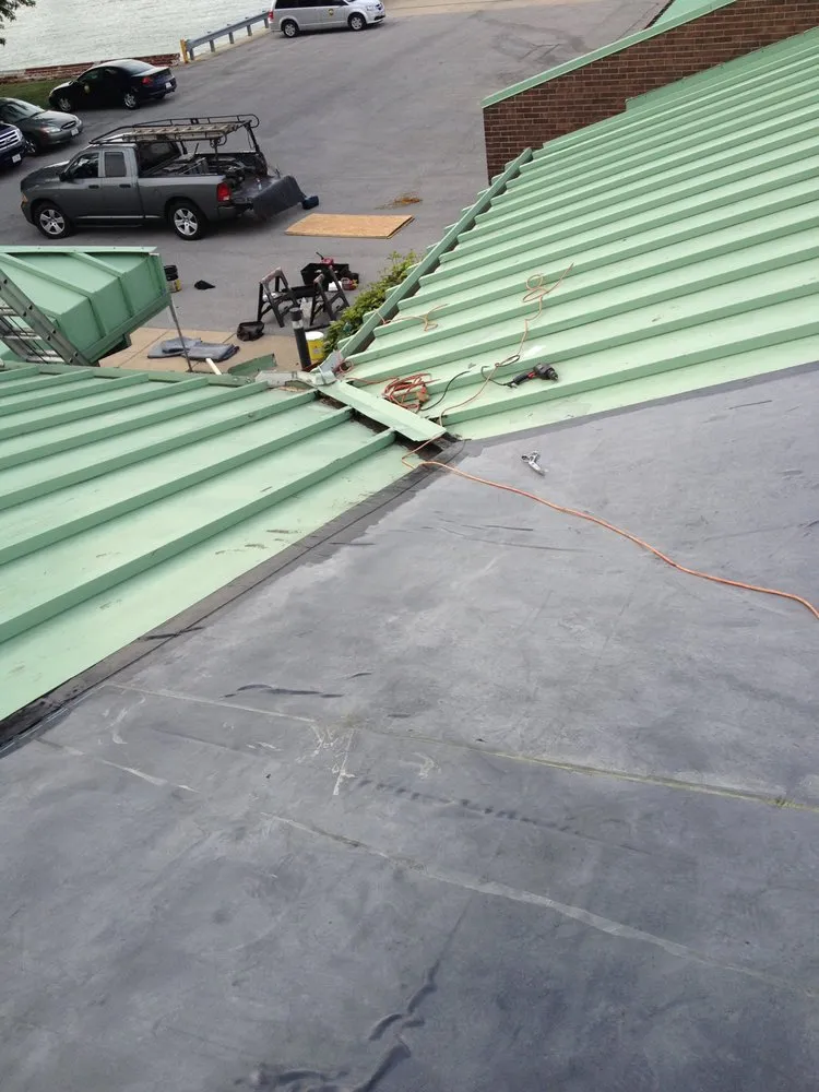 Slide of Absolute roofing