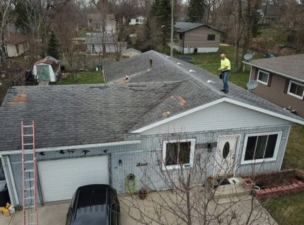 Slide of Absolute Roofing