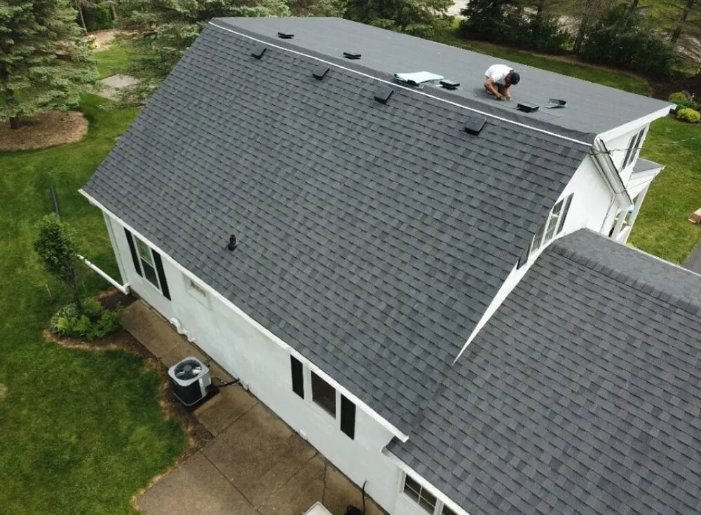 Slide of Absolute Roofing