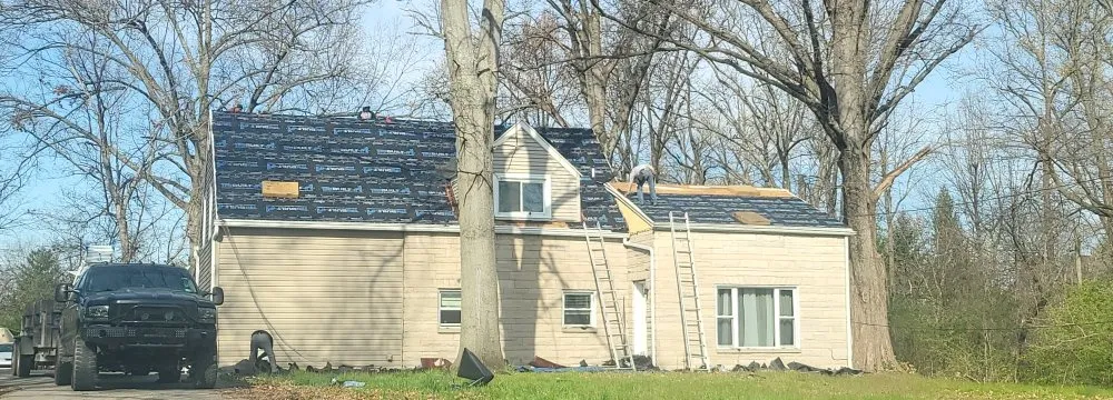 Slide of Absolutely Affordable Roofing