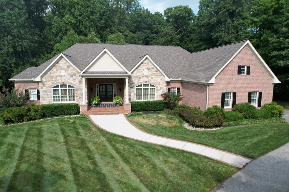 Slide of AC Matthews Roofing & Exteriors