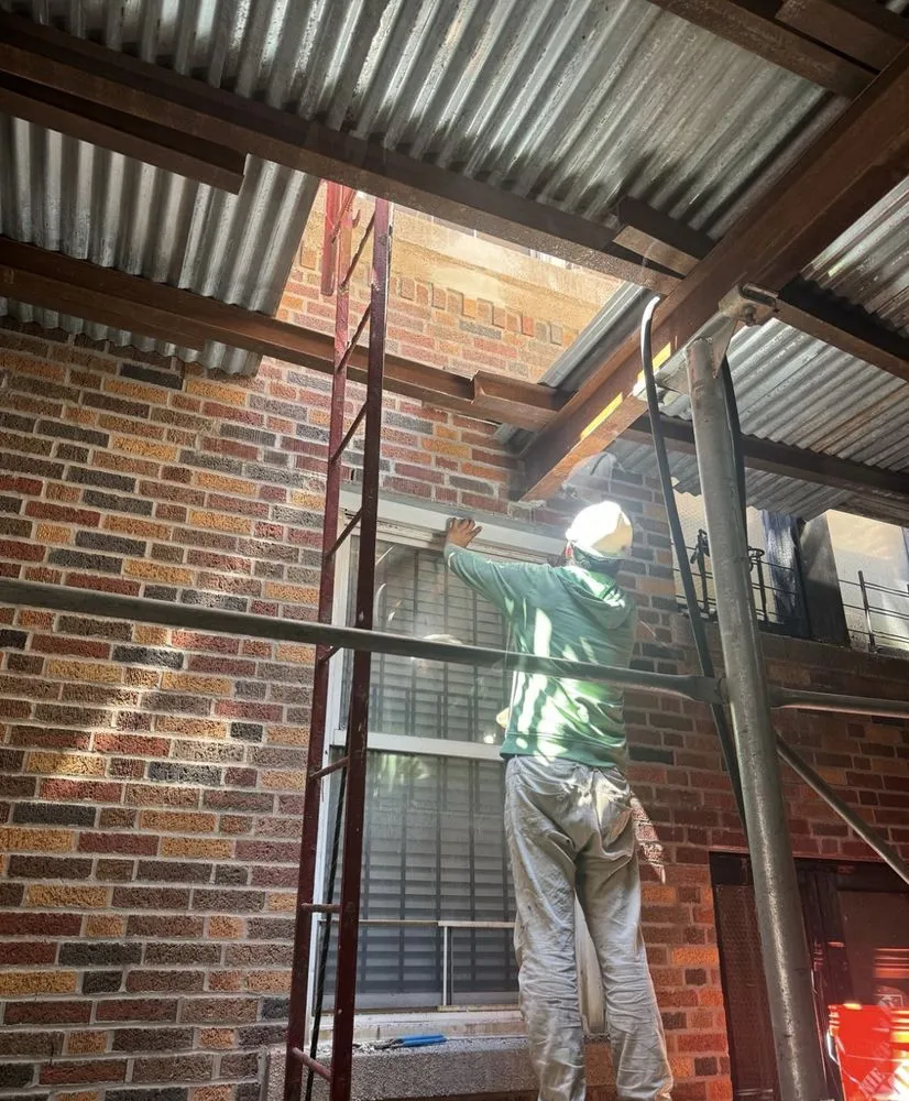 Slide of AC Roofing and Pointing