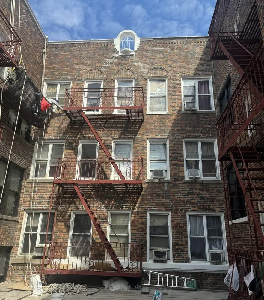 Slide of AC Roofing and Pointing