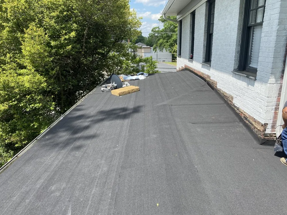 Slide of A&C Roofing