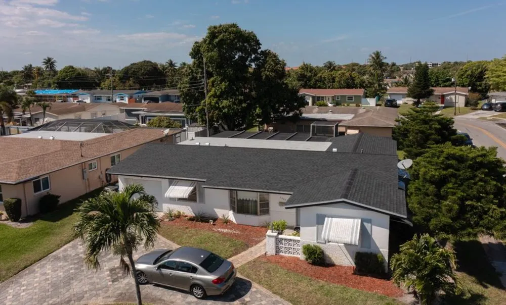 Slide of Academia Roofing & Solar