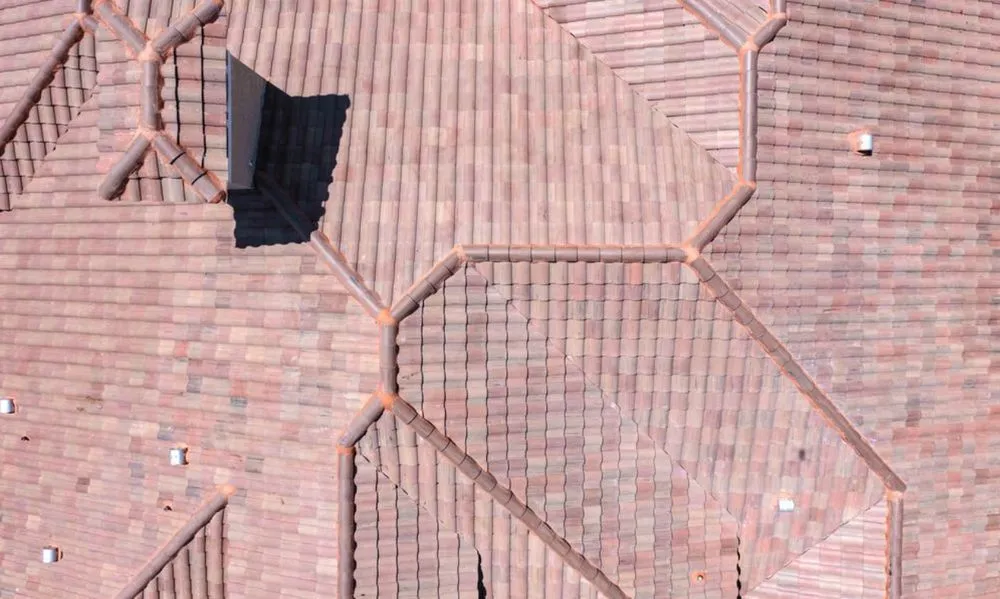 Slide of Academia Roofing & Solar