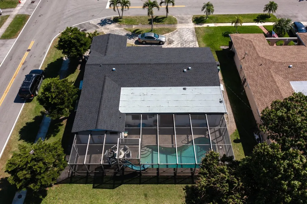 Expert storm damage roof repair for homes in Mami, FL by Academia Roofing and Solar
