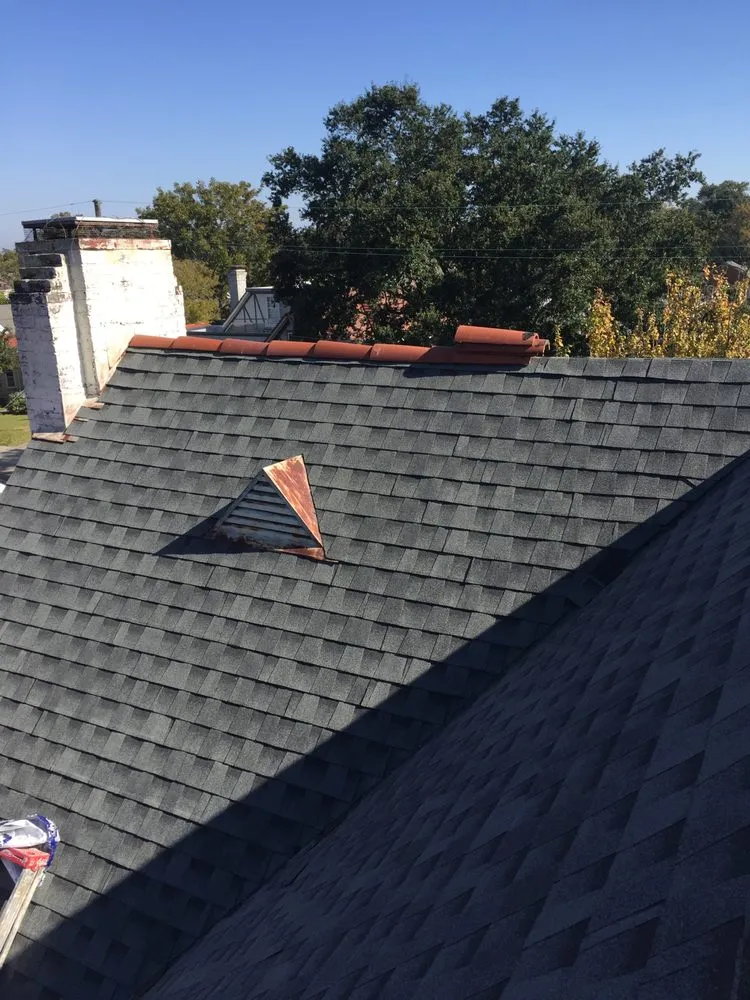 Slide of Acadian Chimney & Construction