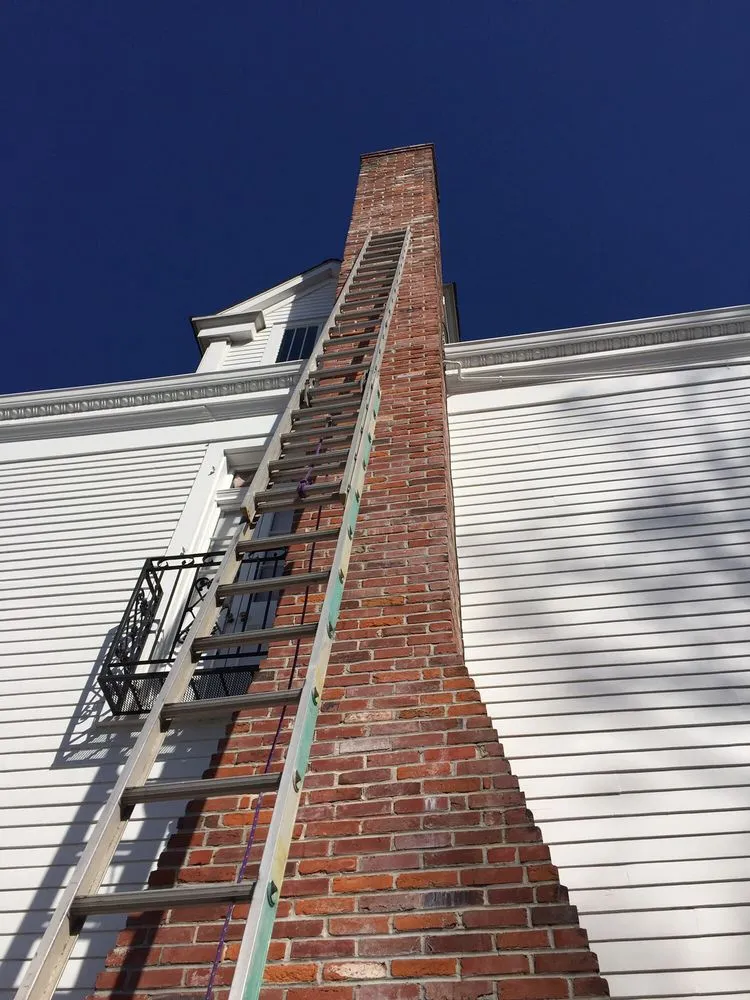 Slide of Acadian Chimney & Construction