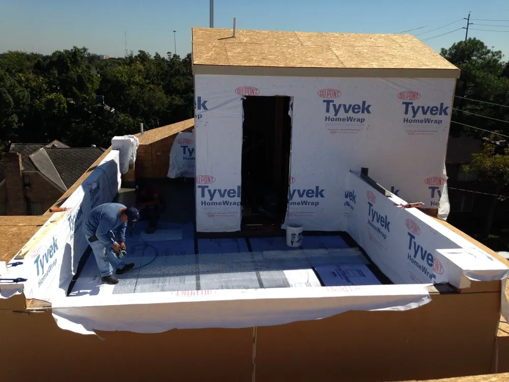 Slide of Acadian Roofing