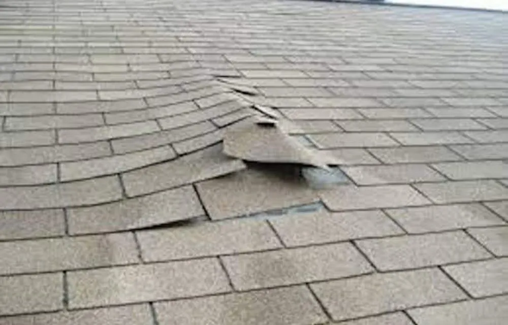 Slide of Acadiana Roofing