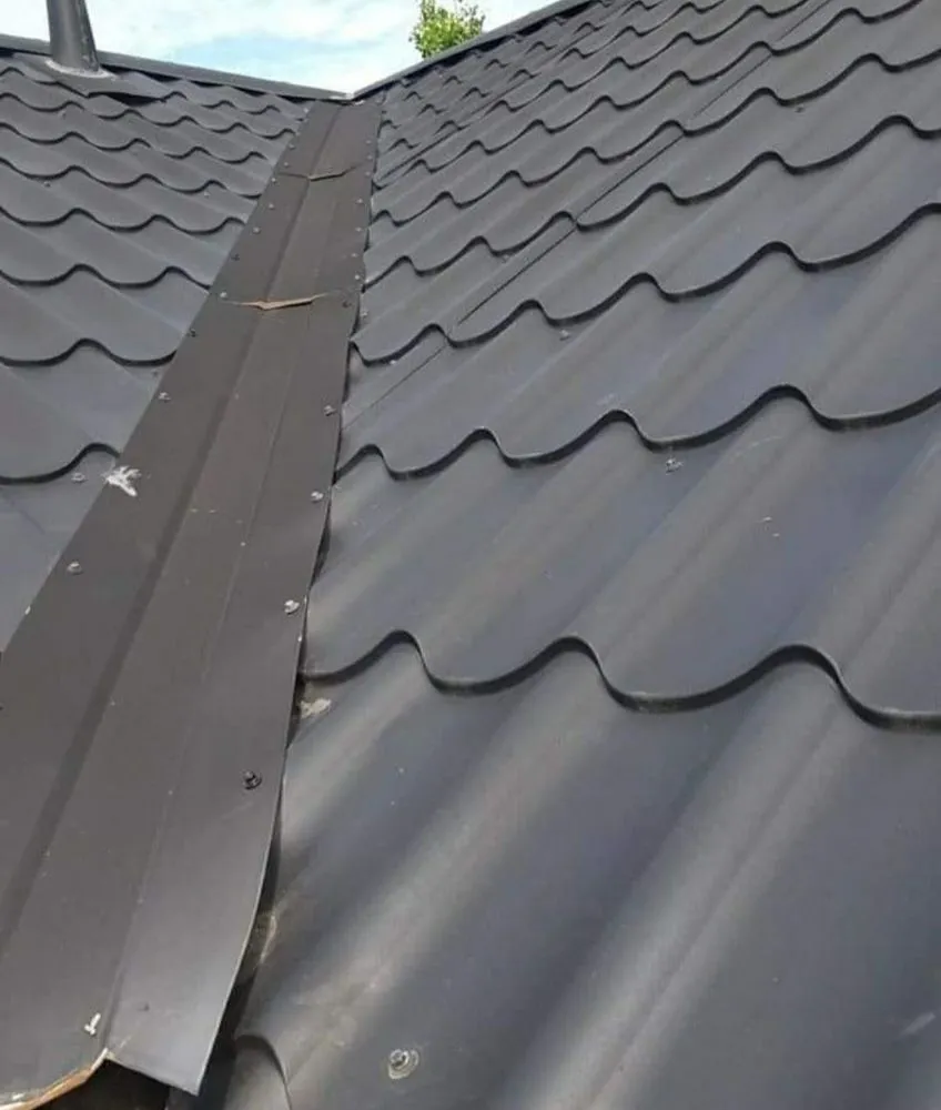 Slide of Acadiana Roofing