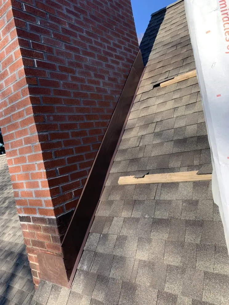 Slide of ACC Roofing Repair