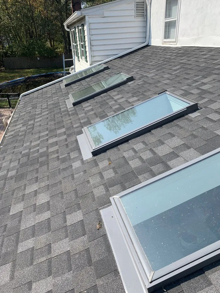 Slide of ACC Roofing Repair