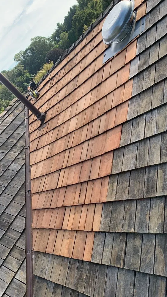 Slide of ACC Roofing Repair