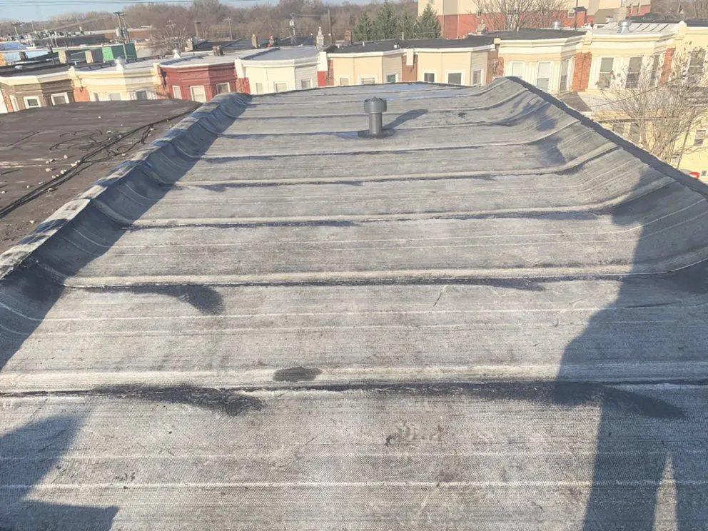 Slide of ACC Roofing Repair