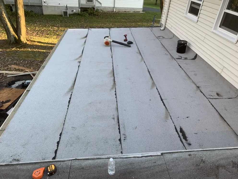 Slide of ACC Roofing Repair