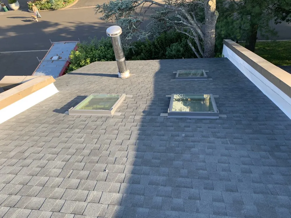 Slide of ACC Roofing Repair