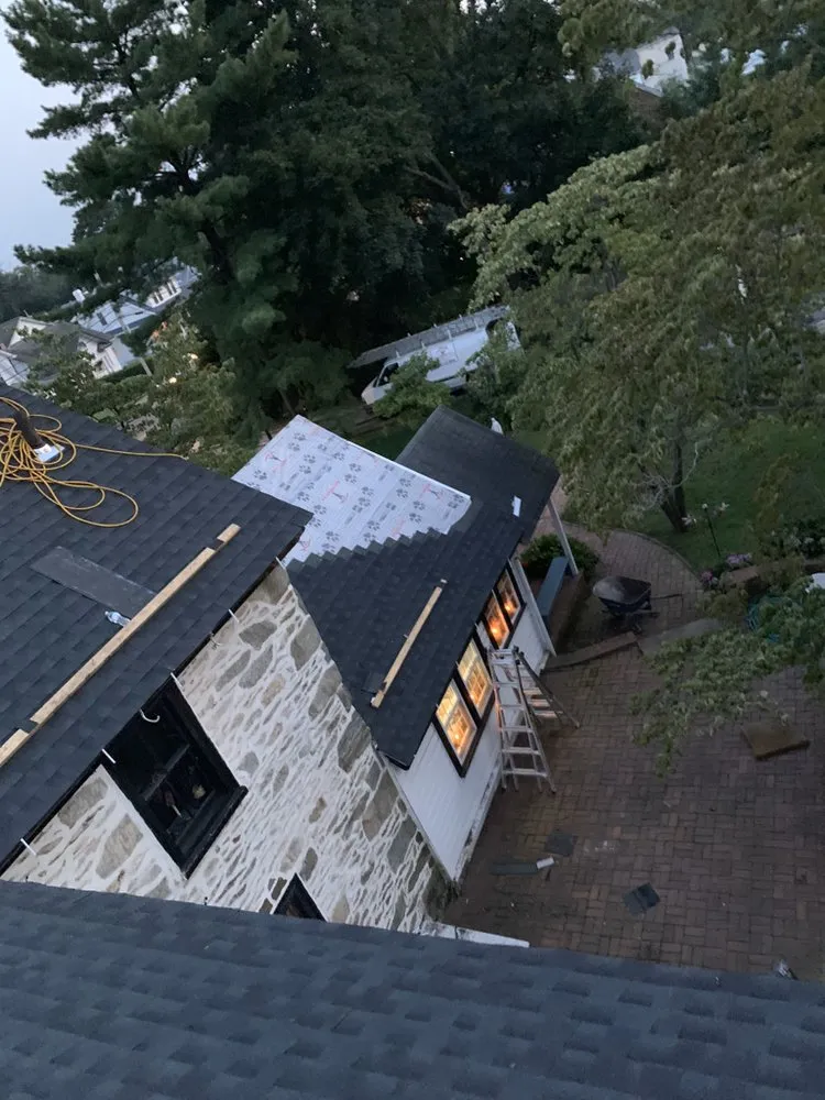 Slide of ACC Roofing Repair