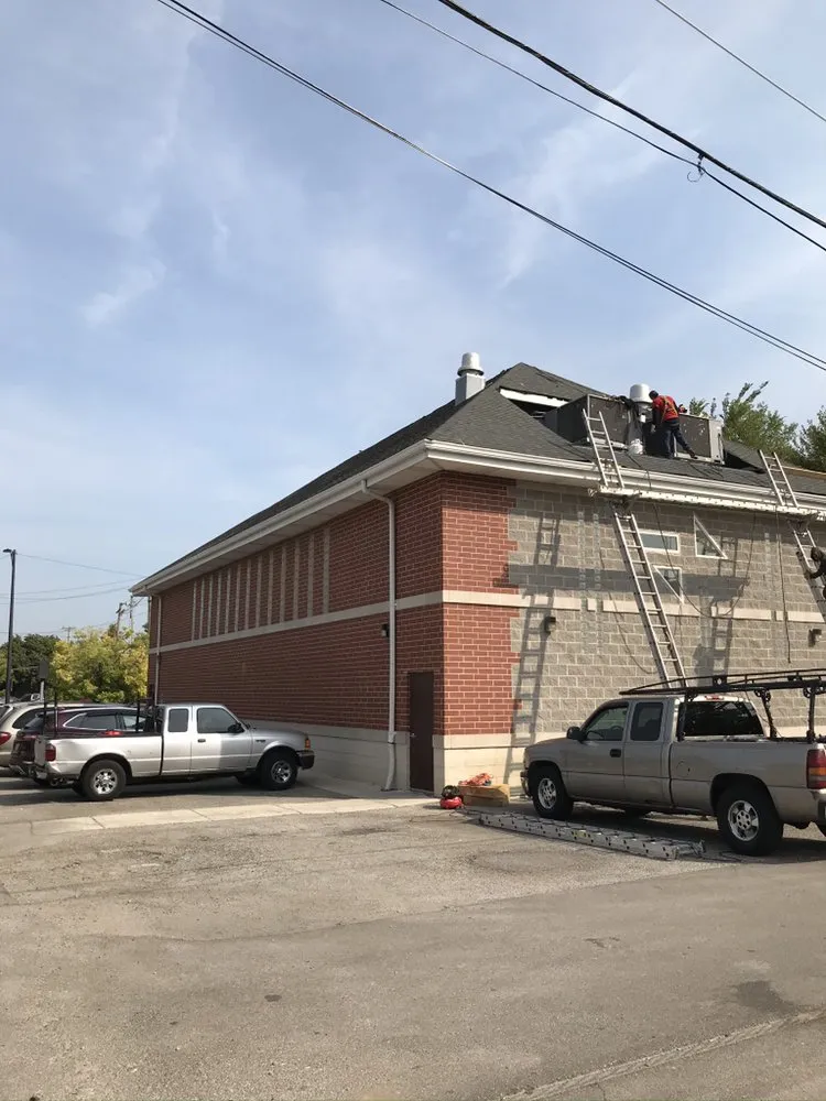 Slide of Accurate Roofing & Tuckpointing