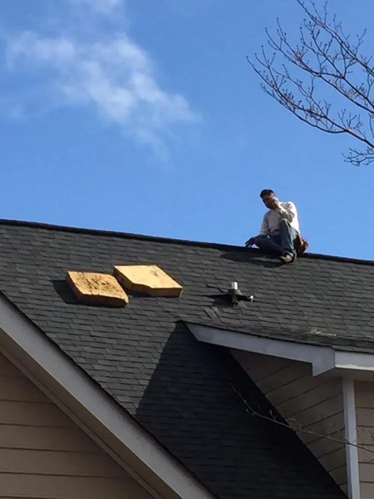 Slide of Accurate Roofing Pros