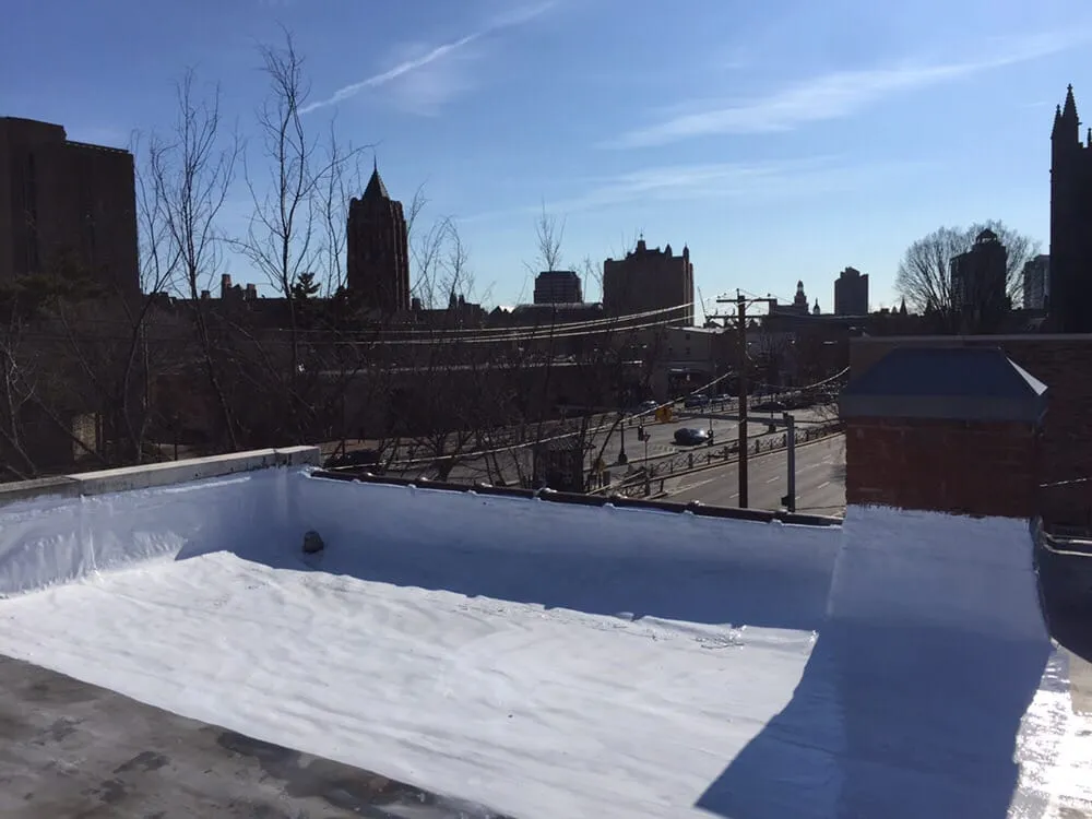 Slide of Ace Flat Roofing