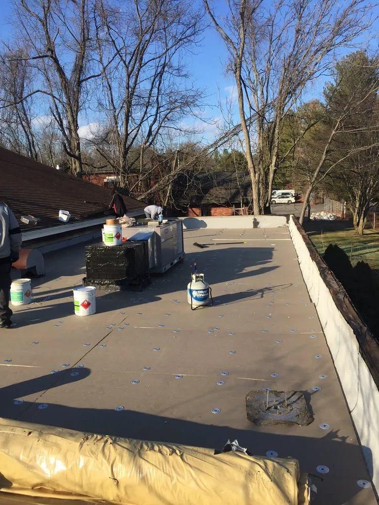 Slide of Ace Flat Roofing