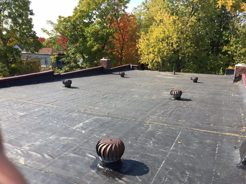 Slide of Ace Flat Roofing