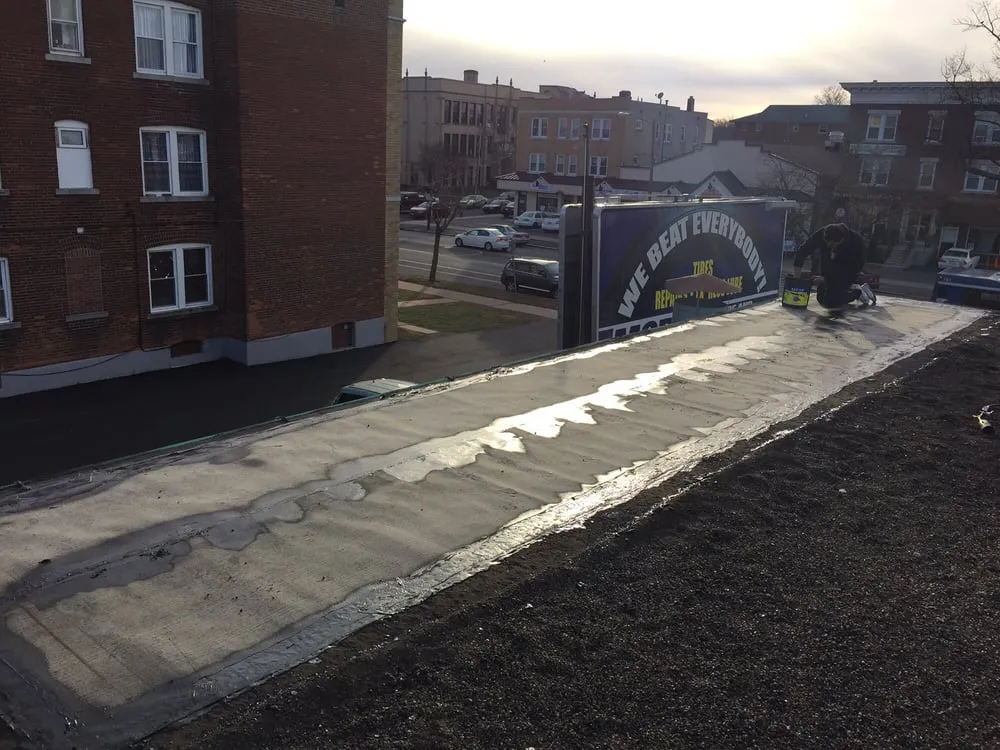 Slide of Ace Flat Roofing