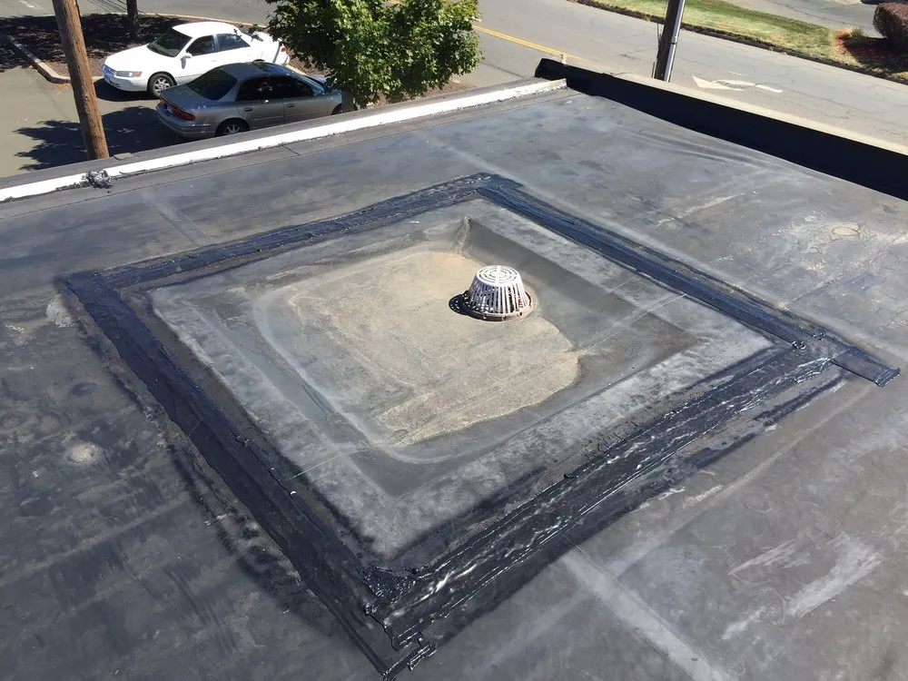 Slide of Ace Flat Roofing