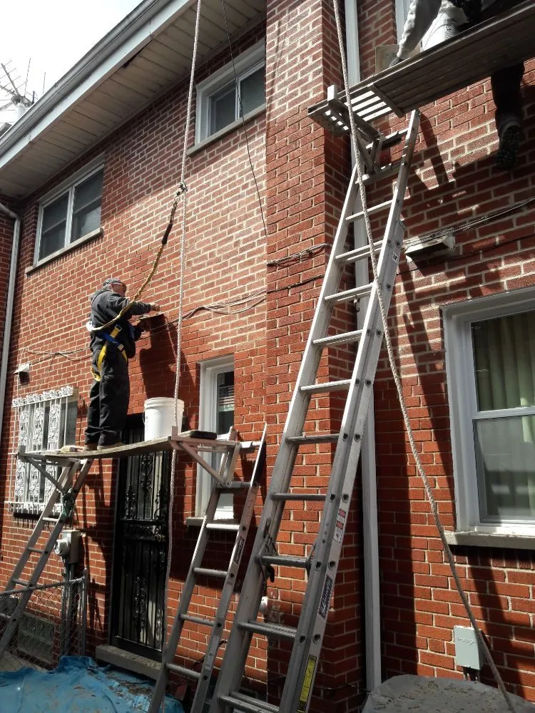 Slide of Ace Quality Roofing & Masonry