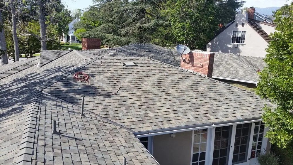 Slide of Ace Roofing Company