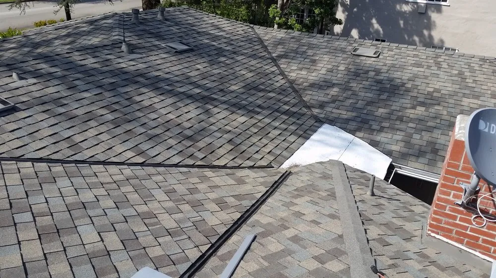 Slide of Ace Roofing Company