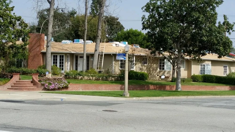 Slide of Ace Roofing Company