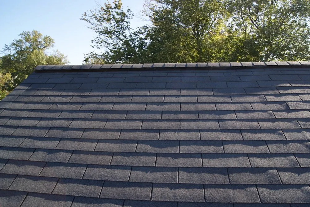 Slide of Ace Roofing Corp