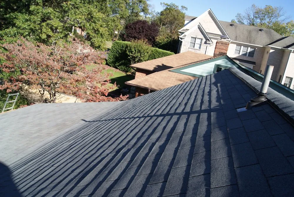 Slide of Ace Roofing Corp