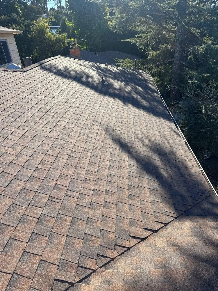 Slide of Acker Roofing