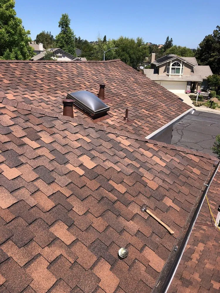 Slide of Acker Roofing