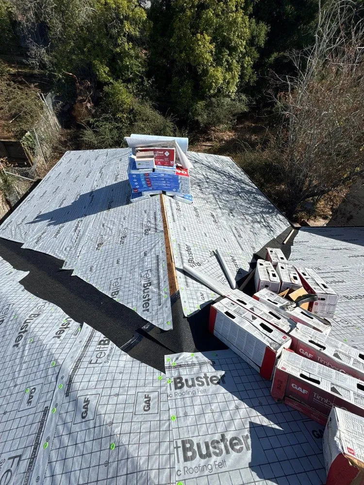 Slide of Acker Roofing