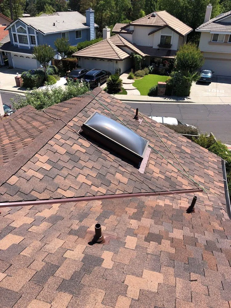 Slide of Acker Roofing