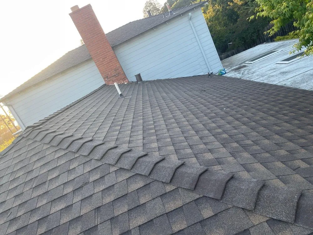 Slide of Acker Roofing