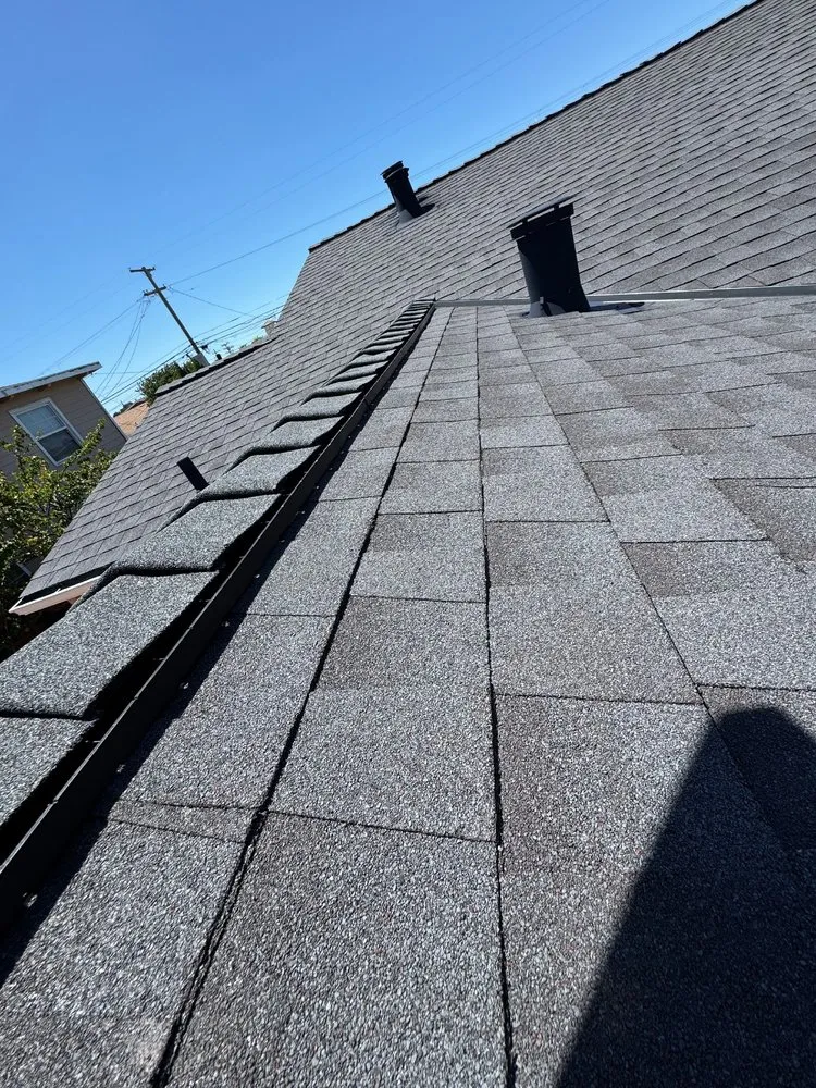 Slide of Acme Roofing Services