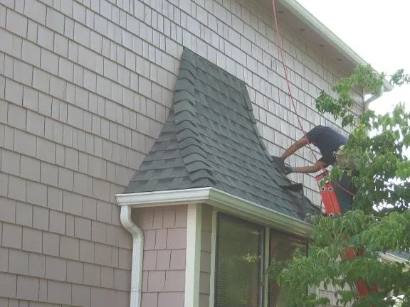 Slide of Acme Roofing