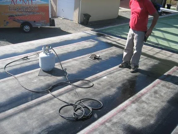 Slide of Acme Roofing