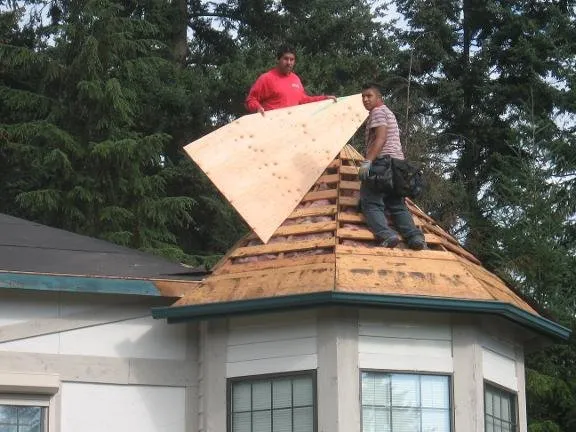 Slide of Acme Roofing