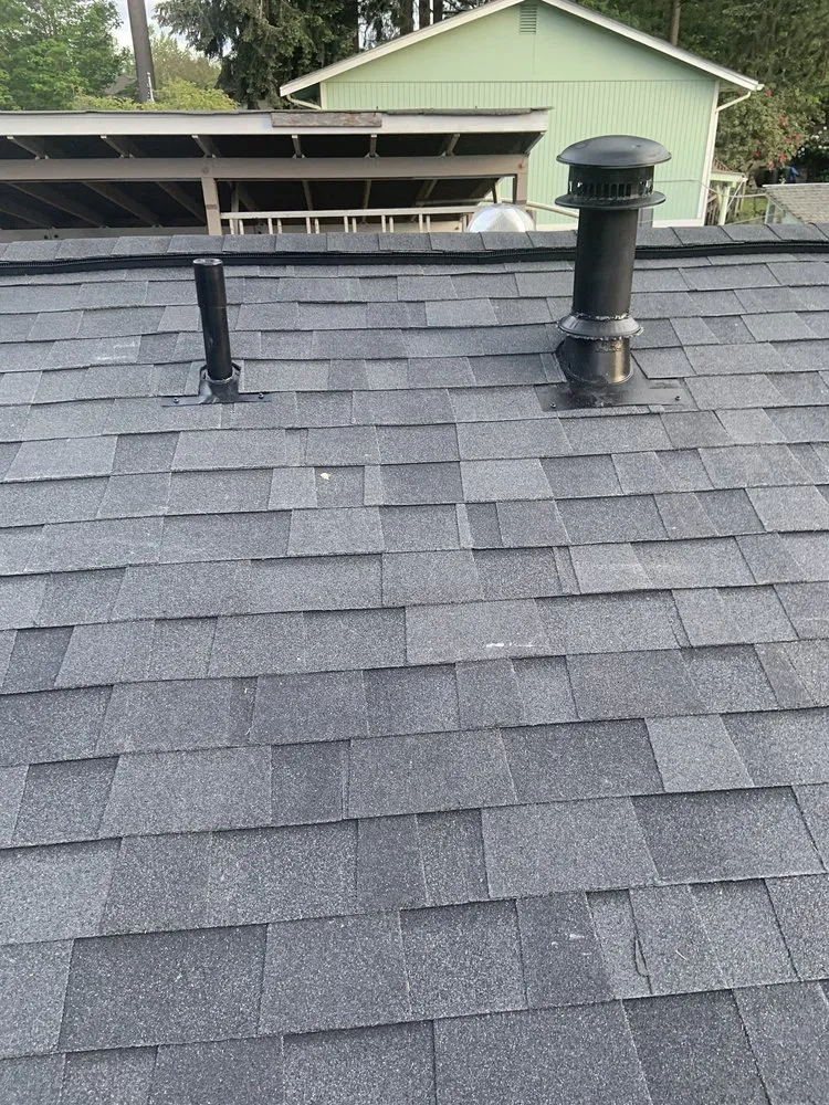 Slide of Acme Roofing