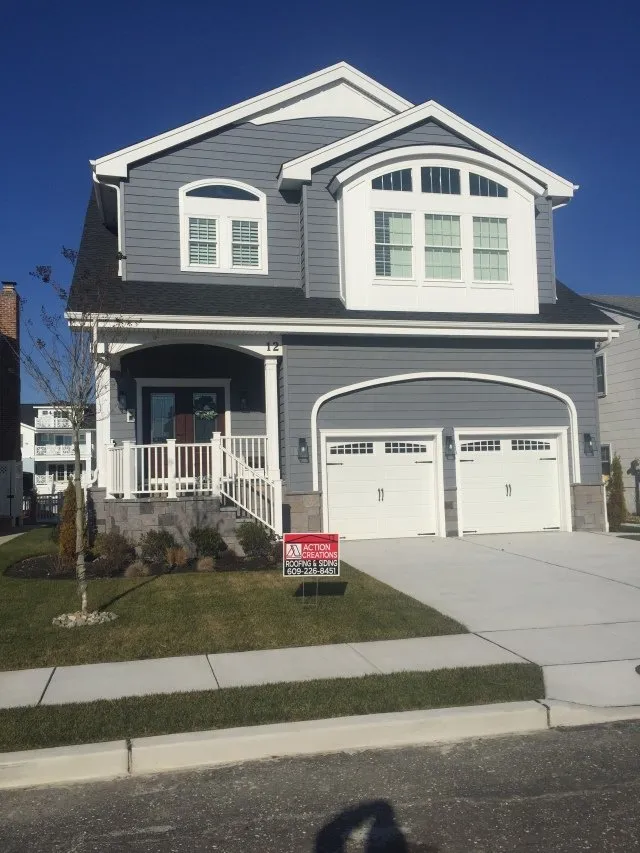 Slide of Action Creations Roofing & Siding